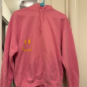 Pink Hoodie with Yellow Graphic
